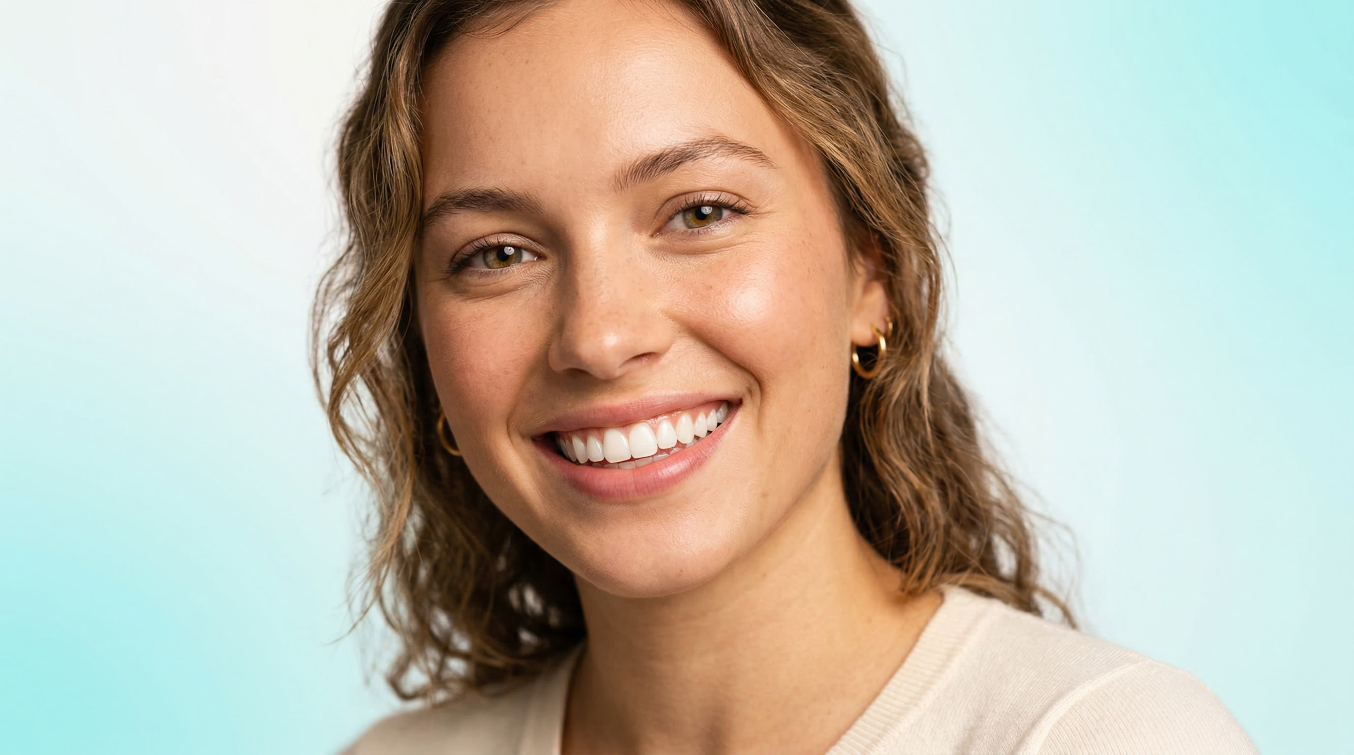 Confident, radiant smile showing perfectly white teeth